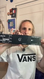 Vantamo customer holding up the tracker card