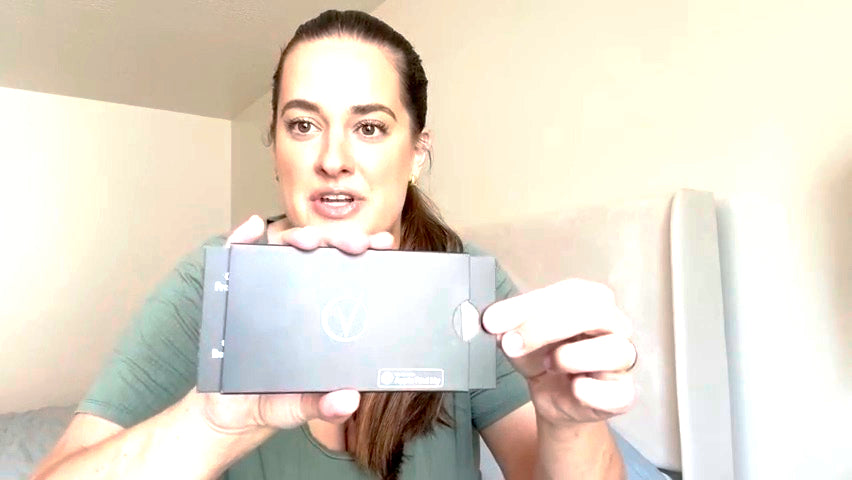 Customer unboxing the Vantamo tracker card